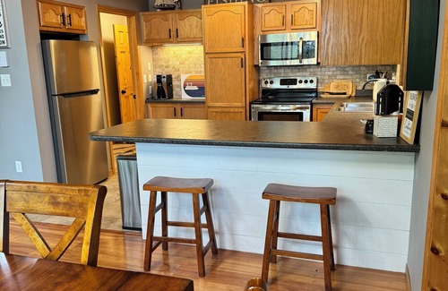 Minong Haus | Blue Chair Bay offers a 234' sandy beach on Minong Flowage w/ impeccable views!