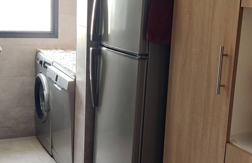 Temara Haus | Blue Themed Vacation Condo close to the beach and with view on the pool