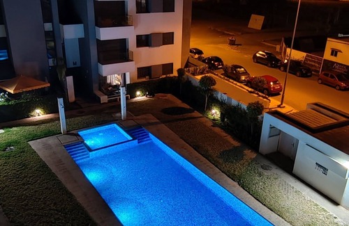 Temara Haus | Blue Themed Vacation Condo close to the beach and with view on the pool