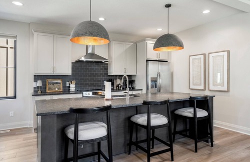 Bowling Green Haus | Brand-new luxury home in downtown Bowling Green, steps from BGSU. Stylish interiors, gourmet kitchen, and a unique backyard with a custom putting green. Perfect for alumni visits, game days, or weekend getaways.