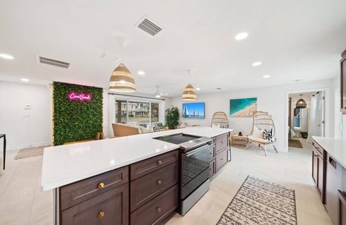 Venetian Way Haus | Bright and Beachy Pool Home