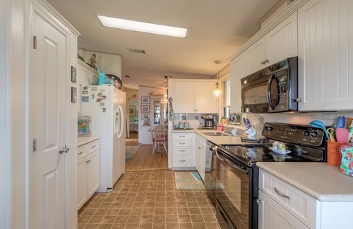 Edgewater Haus | Bring your boat! Huge private dock and community ramp for you on the ICW.