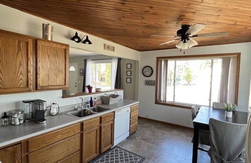 Newaygo Haus | Brookside Retreat- Charming home with lakes and rivers nearby