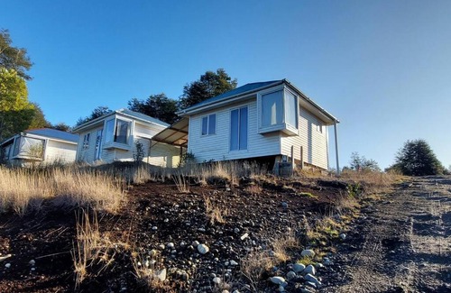 Rilan Haus | Cabaña Carpintero negro