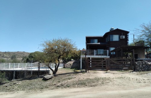 Yocsina Haus | Cabaña en Villa Carlos Paz Danza del sol