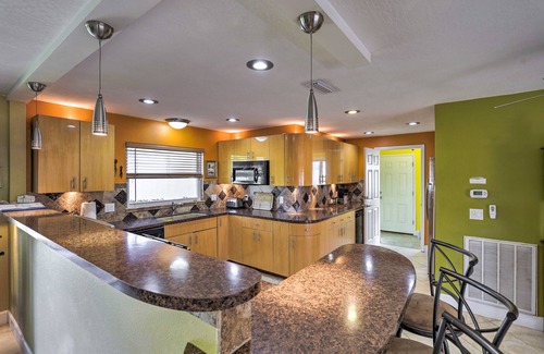 Skylark Estates Hütte | Canal-front Merritt Island Home w/Deck + Grill!