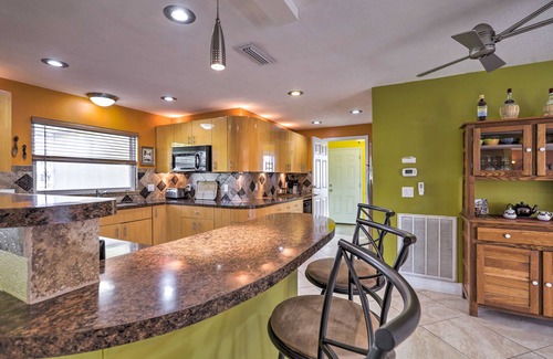 Skylark Estates Hütte | Canal-front Merritt Island Home w/Deck + Grill!