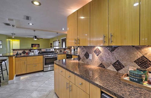 Skylark Estates Hütte | Canal-front Merritt Island Home w/Deck + Grill!