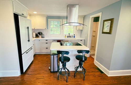 Cape Charles Haus | Cape Charles VA retreat with game arcade 👾, fire pit 🔥, Peloton 🚴🏽♀️, EV🔋