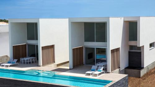 Belnem Villa | CARAIBAS Bonaire modern air-conditioned vacation villa with a private 20 meter magnesium pool