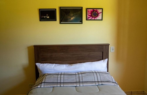 Vila Britania Haus | Casa com grande quintal em Campos do Jordão