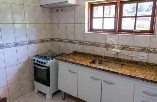 Vila Britania Haus | Casa com grande quintal em Campos do Jordão