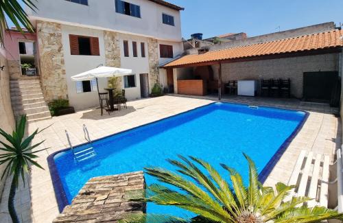 Pauliceia Haus | Casa com piscina e laser