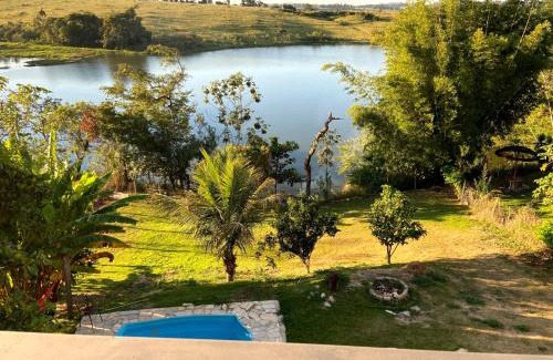 Ijaci Haus | Casa com piscina fundo pra represa e AR Condicionado CasinhaBrancaDeVaranda