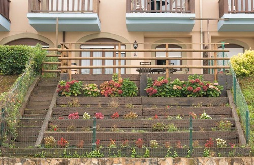 Comillas Wohnung | Casa de Las Flores - Apartamento con jardín privado frente a la Playa de Comillas
