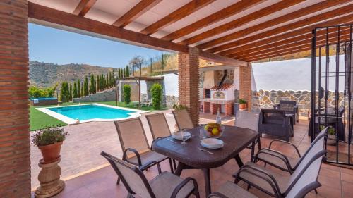 Arenas Haus | Casa La Fuente Pintá Arenas by Ruralidays