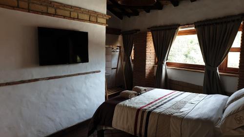 Raquira Hotel | Casona Real Santa Barbara