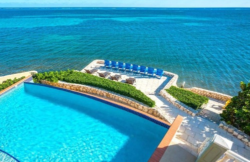 Gun Bay Haus | Cayman Castle by Grand Cayman Villas & Condos
