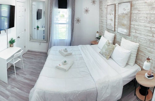 Dover Haus | Centric & spacious home with ample parking and king beds in all rooms.