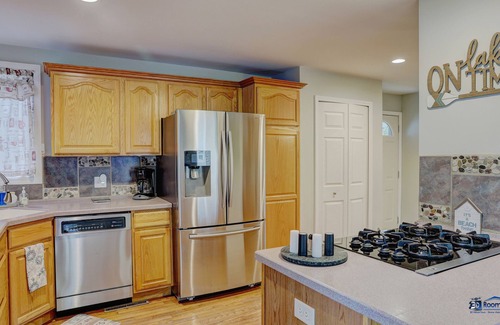 Ingleside Haus | Chain O' Lakes life...serene bay w/ private beach access. Kayaks & Boats welcome