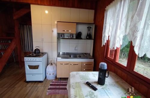 Osorio Skihütte | Chalé Caiu do Céu ll Wi-Fi Nômade Digital ll Táxi Fácil II Quiosque Churrasqueira ll Forno Microondas ll 6km da Estrada do Mar ll 7km Parque de Rodeio ll 8,1Km Prefeitura II 7,2Km UFRGS Litoral II 12km do Morro Borrúsia e Praias de Tramandaí