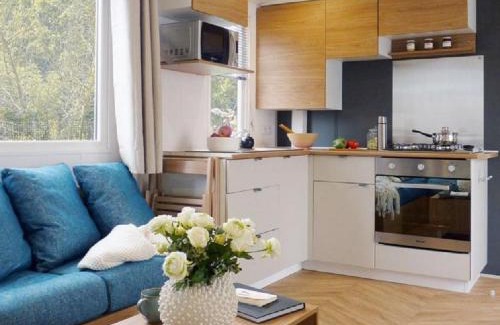 Lauwersoog Sonstige | Chalet op Camping Lauwersoog met 3 slaapkamers en vaatwasser - JoyCasa