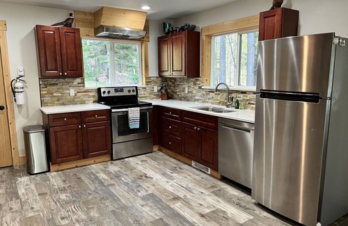 Coram Haus | Chalet tucked in the woods 7 miles from Glacier National Park.