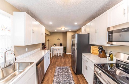 Covington Haus | Charming 3-BR Retreat, Hot Tub, EV, close to Blue Oval City