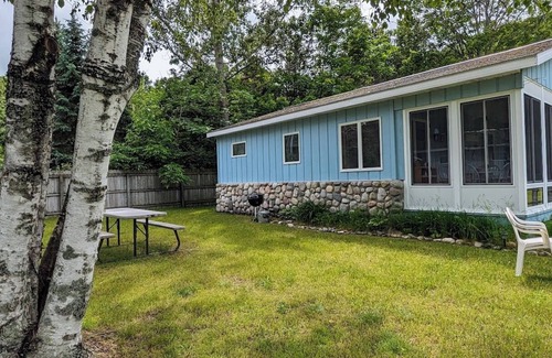 Northport Haus | Charming cottage with shared beachfront on Grand Traverse Bay near Northport.