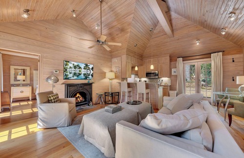 Buckhead Haus | Charming garden guest house tucked behind a gated driveway in Buckhead. King bed, full kitchen, washer/dryer, smart TVs, and private outdoor space.