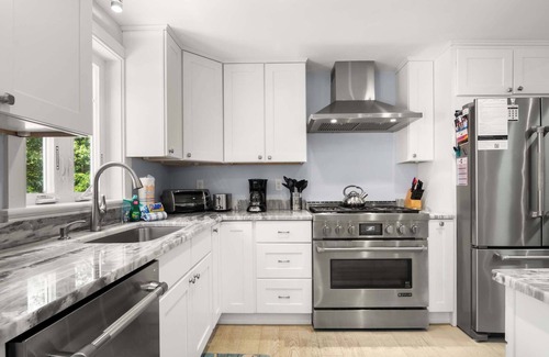 Eastham Haus | Charming Getaway with Hot Tub, Dog Friendly!