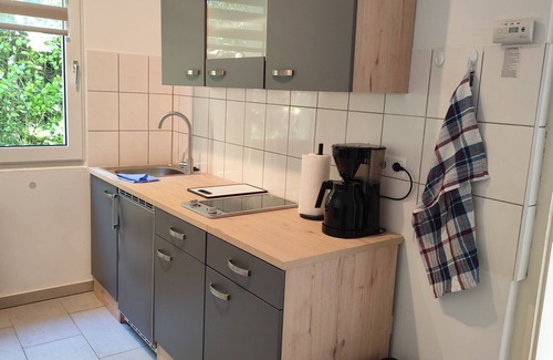 Hagen Wohnung | Charming house within a house - vacation & business apartment with private terrace.