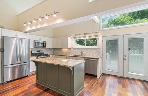 Alpharetta Haus | Charming Meadow Farmhouse on 1+ acre with Hot Tub, walk to Downtown, Renovated