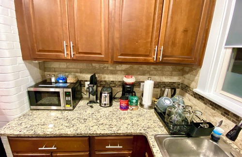 New Rochelle Haus | Charming suite with patio, heating, WiFi, free parking in welcoming New Rochelle