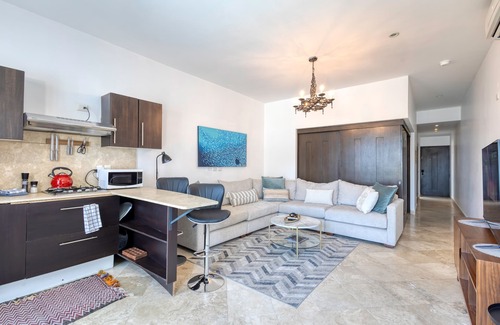 Libertad Wohnung | Charming & sunlit condo with pool & balcony - near golf, beaches, & nightlife