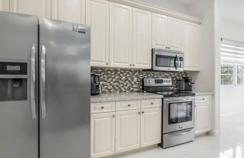 Parkland Haus | Charming townhome 3BR - Gated, Trails, Pool & Balcony, Resort Style Location.