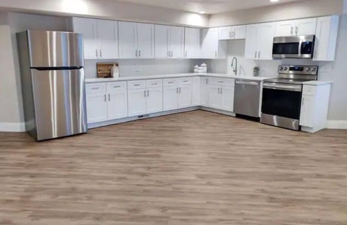 Highland Haus | Cheery and Bright four Bedroom Walkout Basement