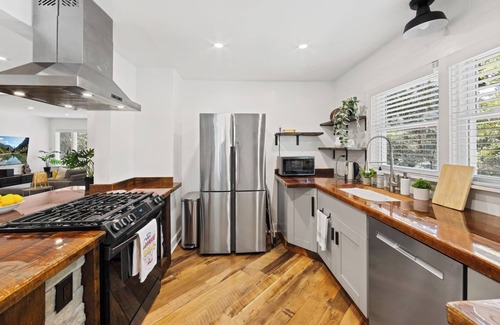 North Druid Hills Haus | Chef's Kitchen; King Bed, Queen & Bunk Bed, 65" TV