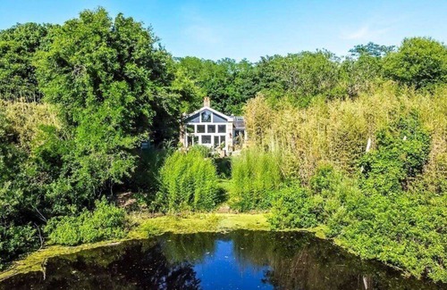 Mattituck Haus | Chic Mattituck waterfront home with beautiful views, slate patio, secluded,...