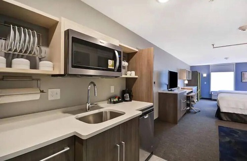 Alpine Center Hotel | City Lights and Comfort Nights: Kitchenette, FREE Breakfast. Pets are Allowed!