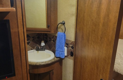 Ocoee Haus | Class A motorhome. In our backyard or a local RV resort.