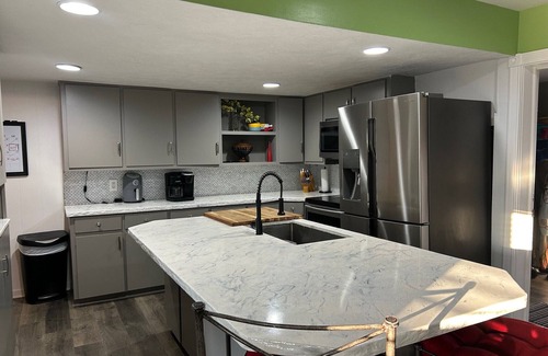 Hudsonville Haus | Close to City and Beaches, Pets Welcome, Hot Tub and Seasonal Pool