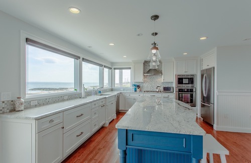 East Falmouth Haus | Coastal chic meets French Provençal in this newly renovated oceanfront home.