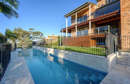 Tascott Haus | Coastal Luxury 2BR w Pool & Entertainer's Paradise