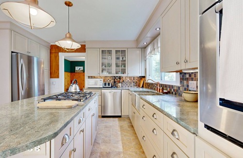 East Sullivan Haus | Coastal Serenity Retreat with Ocean Views, Spacious Porch and Modern Comforts