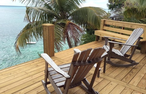 Green Turtle Cay Hütte | Coco Nut Tree House liegt in tropisches Laub auf das kristallklare Meer von Abaco gelegen