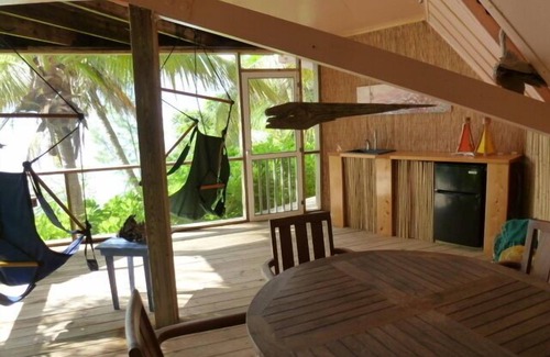 Green Turtle Cay Hütte | Coco Nut Tree House liegt in tropisches Laub auf das kristallklare Meer von Abaco gelegen