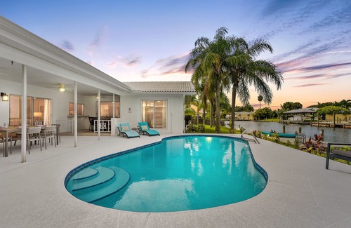 Venetian Way Haus | Cocoa Beach Coral Retreat waterfront 3 BR /2.5 BA