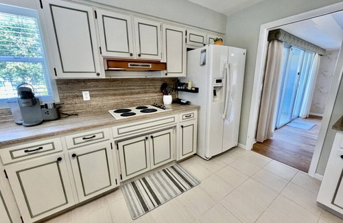 Cocoa Haus | Cocoa Riverside Oasis - King Suite with Private Pool