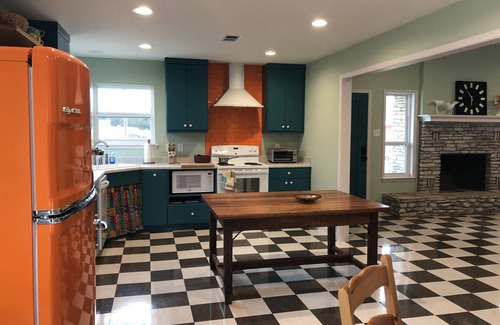 Ingram Haus | Colorful waterfront retro compound, airstream kitchen, hot tub, media barn!